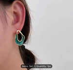 Twisted Oval Hoop Earrings in Germany
