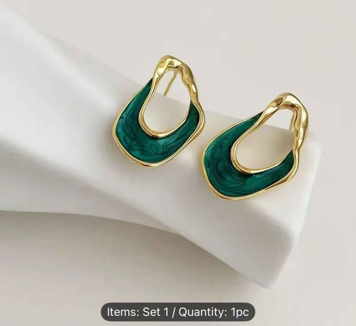 Twisted Oval Hoop Earrings in Germany