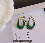 Twisted Oval Hoop Earrings in Germany