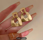 Modern Geometric Drop Earrings in Berlin