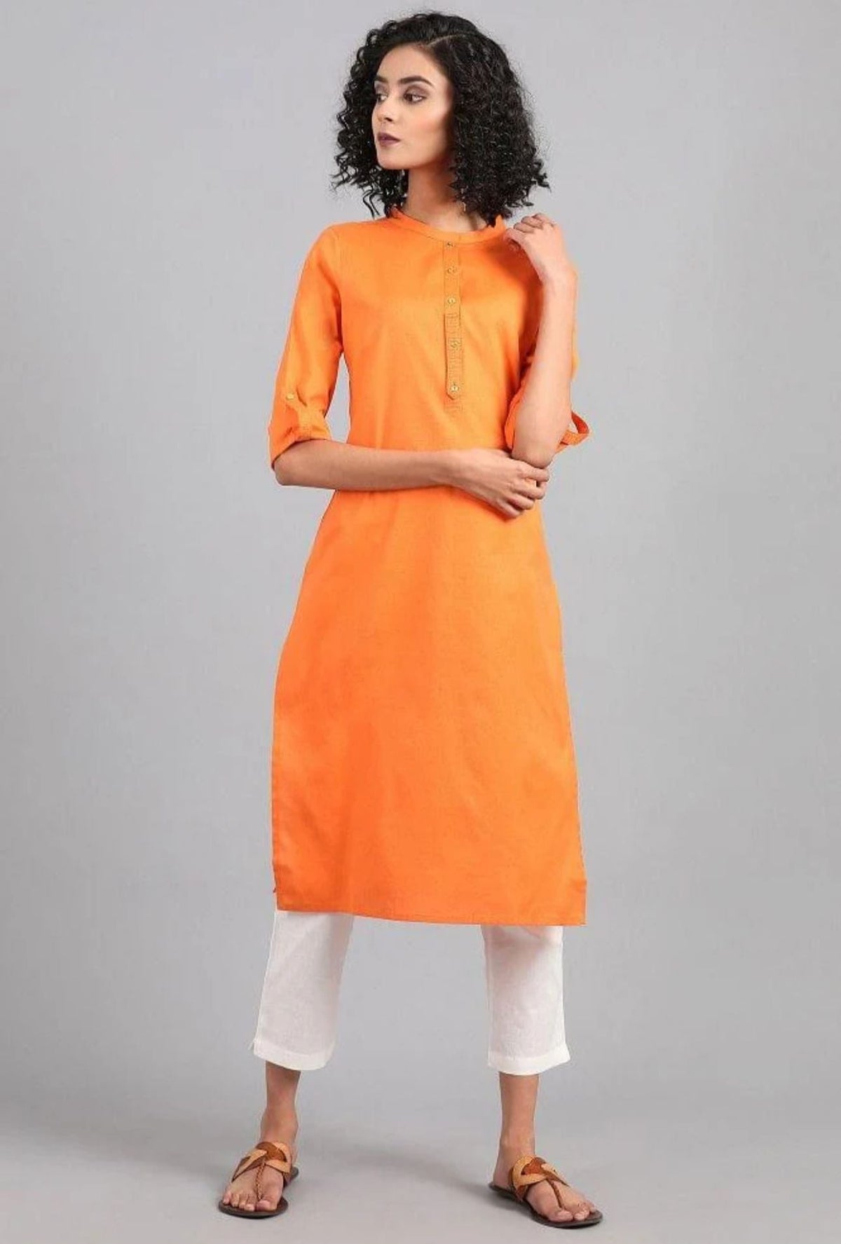 Orange Mandarin Neck Solid kurta in Germany