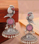 Traditional peacock oxidized silver jhumka earrings in Berlin