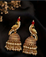 Peacock Shaped Jhumka Earrings with Pearl Drops in Germany