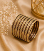 Traditional Brown and Gold  Bangle Stack in Berlin
