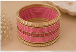 Elegant pink and gold traditional bangle set in Germany