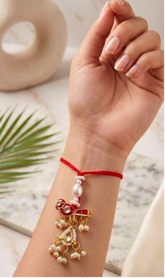 Red Bird Enamel Lumba Rakhi in Germany