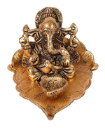 Gold-Toned & Black Ganesha On Leaf With Diya Showpiece in Berlin