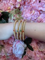 Mad Club elegant pearls studded gold plated 4 pcs bangles set in Munich