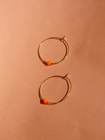 Orange Neon Perle an goldener Edelstahl Creole